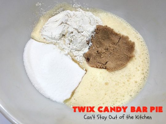 Twix Candy Bar Pie | Can't Stay Out of the Kitchen | this spectacular #pie will have you swooning from the first bite! It's filled with #TwixCandyBars so it's loaded with #chocolate & #caramel. Perfect #dessert for #ValentinesDay & other special occasions or #holidays. #ChocolateDessert #CaramelDessert #TwixCandyBarPie #TwixCandyBarDessert
