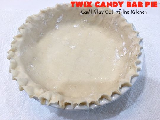 Twix Candy Bar Pie | Can't Stay Out of the Kitchen | this spectacular #pie will have you swooning from the first bite! It's filled with #TwixCandyBars so it's loaded with #chocolate & #caramel. Perfect #dessert for #ValentinesDay & other special occasions or #holidays. #ChocolateDessert #CaramelDessert #TwixCandyBarPie #TwixCandyBarDessert