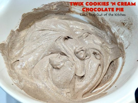 Twix Cookies 'n Cream Chocolate Pie | Can't Stay Out of the Kitchen | this luscious #ChocolatePie uses only 5 ingredients. It's so easy to make for company or #holidays. If you love #TwixCandyBars & #Oreos, you'll love this fabulous #dessert. #chocolate #ChocolateDessert #TwixDessert #5IngredientRecipe #TwixCookiesNCreamChocolatePie