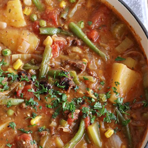 Vegetable Beef Stew | Can't Stay Out of the Kitchen | this amazing #BeefStew is one of our favorite comfort food #recipes. It's so hearty, filling & satisfying that you'll want second & third helpings! #potatoes #carrots #beef #peas #corn #GreenBeans #VegetableBeefStew