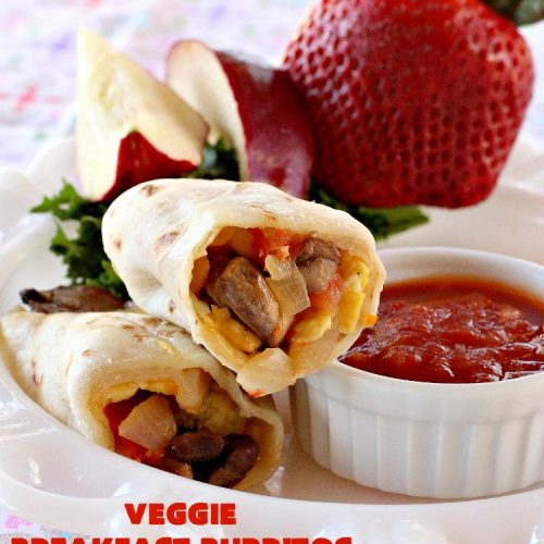 Veggie Breakfast Burritos | Can't Stay Out of the Kitchen | these delicious #burritos are terrific for on-the-go breakfasts. They can be refrigerated or frozen and microwaved just before you're heading out the door! This #healthy #breakfast option is wonderful for company or #MeatlessMondays too. #tomatoes #bellpeppers #mushrooms #tortillas #CheddarCheese #eggs #holiday #HolidayBreakfast #VeggieBreakfastBurritos #BreakfastBurritos #HealthyBreakfastBurritos