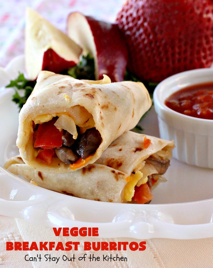 Veggie Breakfast Burritos | Can't Stay Out of the Kitchen | these delicious #burritos are terrific for on-the-go breakfasts. They can be refrigerated or frozen and microwaved just before you're heading out the door! This #healthy #breakfast option is wonderful for company or #MeatlessMondays too. #tomatoes #bellpeppers #mushrooms #tortillas #CheddarCheese #eggs #holiday #HolidayBreakfast #VeggieBreakfastBurritos #BreakfastBurritos #HealthyBreakfastBurritos