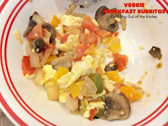 Veggie Breakfast Burritos | Can't Stay Out of the Kitchen | these delicious #burritos are terrific for on-the-go breakfasts. They can be refrigerated or frozen and microwaved just before you're heading out the door! This #healthy #breakfast option is wonderful for company or #MeatlessMondays too. #tomatoes #bellpeppers #mushrooms #tortillas #CheddarCheese #eggs #holiday #HolidayBreakfast #VeggieBreakfastBurritos #BreakfastBurritos #HealthyBreakfastBurritos