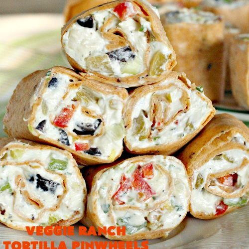 Veggie Ranch Tortilla Pinwheels | Can't Stay Out of the Kitchen | these #TexMex #appetizers are heavenly! They're made with a cream cheese & #Ranch dressing mix base. Then filled with green #chilies, #bacon, #olives & #peppers. Perfect for #tailgating, #NewYearsEve or #SuperBowl parties!