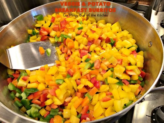 Veggie and Potato Breakfast Burritos | Can't Stay Out of the Kitchen | these delightful #BreakfastBurritos are awesome for a weekend, company or #holiday #breakfast. They can easily be prepared & frozen in advance & then microwaved before serving. Terrific for a grab and go breakfast too. #Tortillas #eggs #CheddarCheese #mushrooms #potatoes #Vegetarian #vegetables #VeggieAndPotatoBreakfastBurritos #brunch #HolidayBreakfast #MeatlessMondays