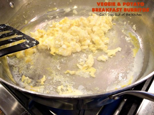 Veggie and Potato Breakfast Burritos | Can't Stay Out of the Kitchen | these delightful #BreakfastBurritos are awesome for a weekend, company or #holiday #breakfast. They can easily be prepared & frozen in advance & then microwaved before serving. Terrific for a grab and go breakfast too. #Tortillas #eggs #CheddarCheese #mushrooms #potatoes #Vegetarian #vegetables #VeggieAndPotatoBreakfastBurritos #brunch #HolidayBreakfast #MeatlessMondays