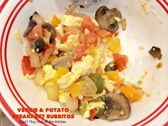 Veggie and Potato Breakfast Burritos | Can't Stay Out of the Kitchen | these delightful #BreakfastBurritos are awesome for a weekend, company or #holiday #breakfast. They can easily be prepared & frozen in advance & then microwaved before serving. Terrific for a grab and go breakfast too. #Tortillas #eggs #CheddarCheese #mushrooms #potatoes #Vegetarian #vegetables #VeggieAndPotatoBreakfastBurritos #brunch #HolidayBreakfast #MeatlessMondays