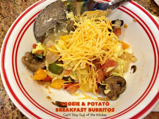 Veggie and Potato Breakfast Burritos | Can't Stay Out of the Kitchen | these delightful #BreakfastBurritos are awesome for a weekend, company or #holiday #breakfast. They can easily be prepared & frozen in advance & then microwaved before serving. Terrific for a grab and go breakfast too. #Tortillas #eggs #CheddarCheese #mushrooms #potatoes #Vegetarian #vegetables #VeggieAndPotatoBreakfastBurritos #brunch #HolidayBreakfast #MeatlessMondays