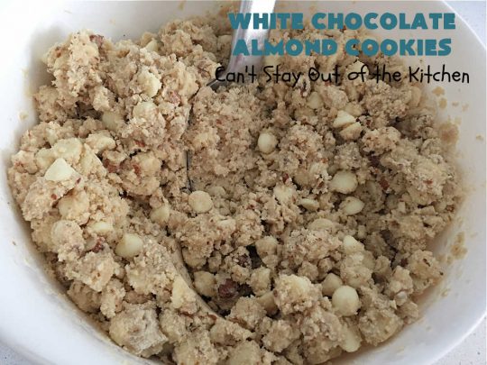 White Chocolate Almond Cookies | Can't Stay Out of the Kitchen | these delectable #cookies are made with REAL #WhiteChocolateChips not merely vanilla chips so they have that chocolaty flavor everyone loves. Plus they're chocked full of diced #almonds which add another dimension and flavor that's simply heavenly. Excellent for a potluck, #ChristmasCookieExchange or #tailgating party. Every bite will rock your world! #chocolate #dessert #HolidayDessert #ChocolateDessert #WhiteChocolateAlmondCookies