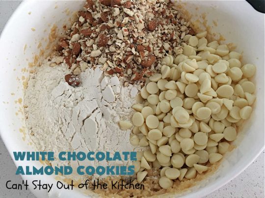 White Chocolate Almond Cookies | Can't Stay Out of the Kitchen | these delectable #cookies are made with REAL #WhiteChocolateChips not merely vanilla chips so they have that chocolaty flavor everyone loves. Plus they're chocked full of diced #almonds which add another dimension and flavor that's simply heavenly. Excellent for a potluck, #ChristmasCookieExchange or #tailgating party. Every bite will rock your world! #chocolate #dessert #HolidayDessert #ChocolateDessert #WhiteChocolateAlmondCookies