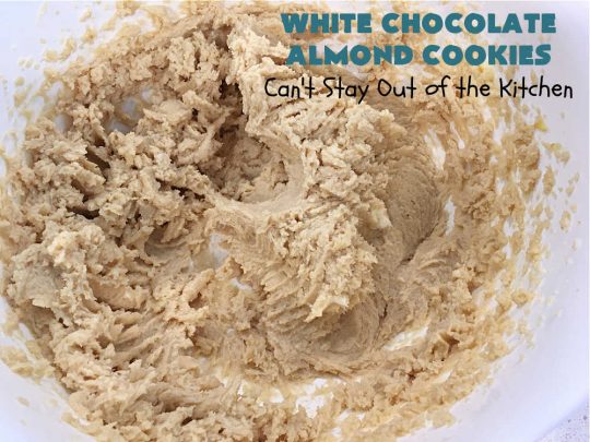 White Chocolate Almond Cookies | Can't Stay Out of the Kitchen | these delectable #cookies are made with REAL #WhiteChocolateChips not merely vanilla chips so they have that chocolaty flavor everyone loves. Plus they're chocked full of diced #almonds which add another dimension and flavor that's simply heavenly. Excellent for a potluck, #ChristmasCookieExchange or #tailgating party. Every bite will rock your world! #chocolate #dessert #HolidayDessert #ChocolateDessert #WhiteChocolateAlmondCookies