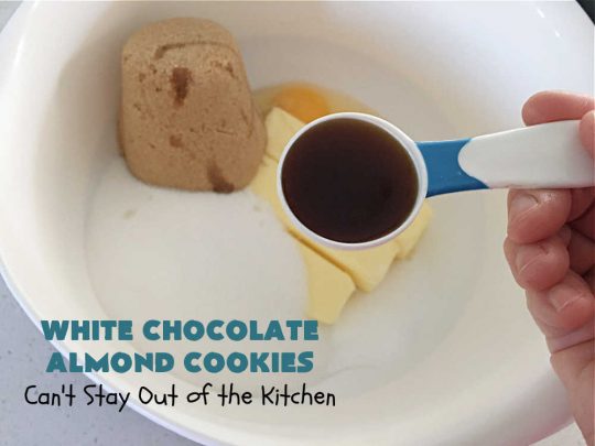 White Chocolate Almond Cookies | Can't Stay Out of the Kitchen | these delectable #cookies are made with REAL #WhiteChocolateChips not merely vanilla chips so they have that chocolaty flavor everyone loves. Plus they're chocked full of diced #almonds which add another dimension and flavor that's simply heavenly. Excellent for a potluck, #ChristmasCookieExchange or #tailgating party. Every bite will rock your world! #chocolate #dessert #HolidayDessert #ChocolateDessert #WhiteChocolateAlmondCookies