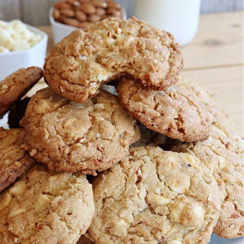 White Chocolate Almond Cookies | Can't Stay Out of the Kitchen | these delectable #cookies are made with REAL #WhiteChocolateChips not merely vanilla chips so they have that chocolaty flavor everyone loves. Plus they're chocked full of diced #almonds which add another dimension and flavor that's simply heavenly. Excellent for a potluck, #ChristmasCookieExchange or #tailgating party. Every bite will rock your world! #chocolate #dessert #HolidayDessert #ChocolateDessert #WhiteChocolateAlmondCookies