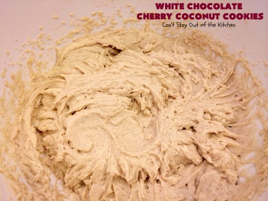 White Chocolate Cherry Coconut Cookies | Can't Stay Out of the Kitchen | these amazing #cookies have it all! They're festive, beautiful and taste incredibly good. Perfect for #holiday parties or #ChristmasCookieExchanges. #tailgating #dessert #ChocolateDessert #WhiteChocolateChips #Cherries #coconut #CherryDessert