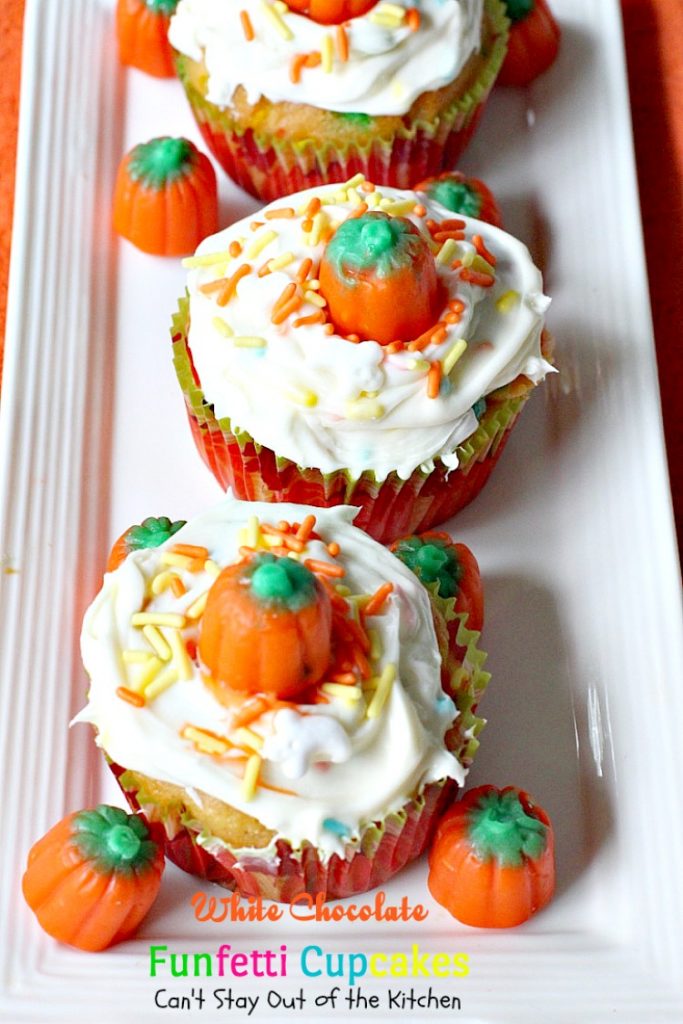 White Chocolate Funfetti Cupcakes | Can't Stay Out of the Kitchen | these fabulous #funfetti #cupcakes are filled with #whitechocolatechips and are so quick and easy to make. They're great for any #holiday party. #chocolate #dessert