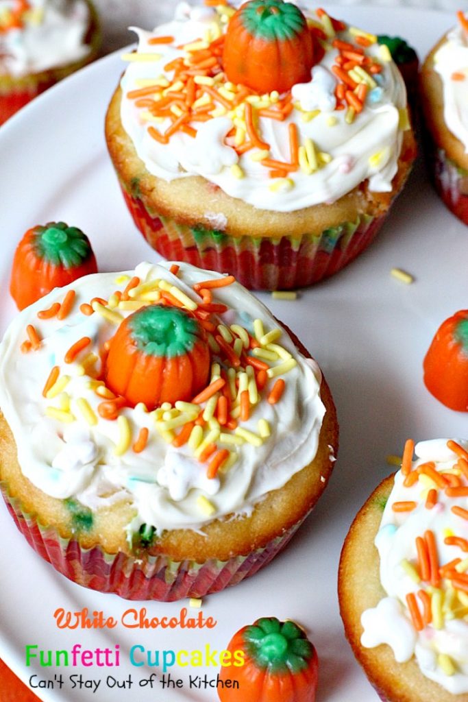 White Chocolate Funfetti Cupcakes | Can't Stay Out of the Kitchen | these fabulous #funfetti #cupcakes are filled with #whitechocolatechips and are so quick and easy to make. They're great for any #holiday party. #chocolate #dessert