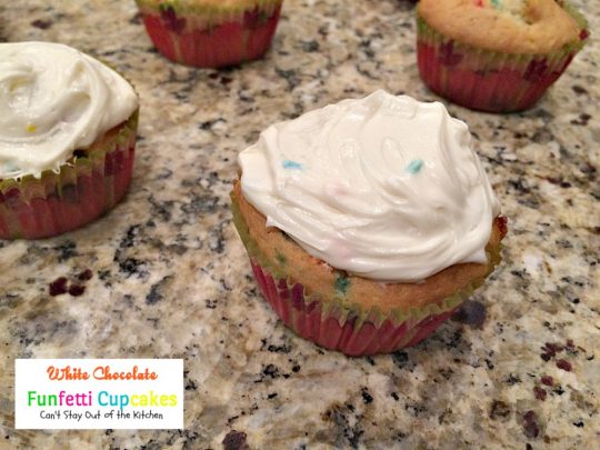 White Chocolate Funfetti Cupcakes | Can't Stay Out of the Kitchen | these fabulous #funfetti #cupcakes are filled with #whitechocolatechips and are so quick and easy to make. They're great for any #holiday party. #chocolate #dessert