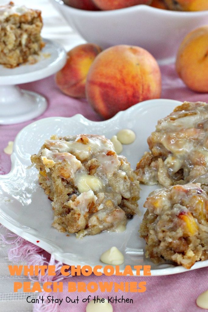 White Chocolate Peach Brownies | Can't Stay Out of the Kitchen | these fantastic #brownies are ooey, gooey decadent & divine! They're filled with #coconut, #walnuts, #peaches & white #chocolatechips. Then they're drizzled with white #chocolate icing. This #dessert is fantastic during the #summer when peaches are in season.