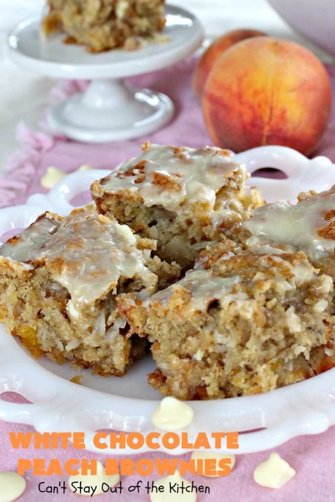 White Chocolate Peach Brownies | Can't Stay Out of the Kitchen | these fantastic #brownies are ooey, gooey decadent & divine! They're filled with #coconut, #walnuts, #peaches & white #chocolatechips. Then they're drizzled with white #chocolate icing. This #dessert is fantastic during the #summer when peaches are in season.