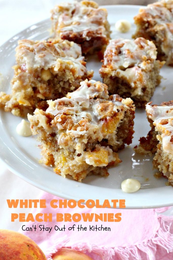White Chocolate Peach Brownies | Can't Stay Out of the Kitchen | these fantastic #brownies are ooey, gooey decadent & divine! They're filled with #coconut, #walnuts, #peaches & white #chocolatechips. Then they're drizzled with white #chocolate icing. This #dessert is fantastic during the #summer when peaches are in season.