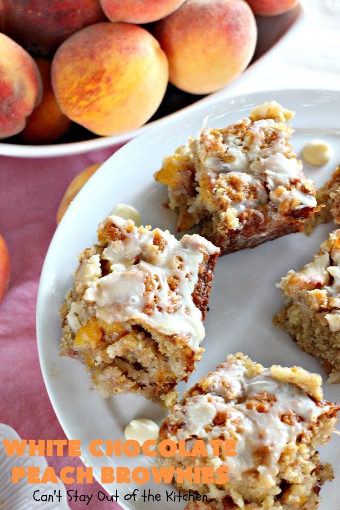 White Chocolate Peach Brownies | Can't Stay Out of the Kitchen | these fantastic #brownies are ooey, gooey decadent & divine! They're filled with #coconut, #walnuts, #peaches & white #chocolatechips. Then they're drizzled with white #chocolate icing. This #dessert is fantastic during the #summer when peaches are in season.
