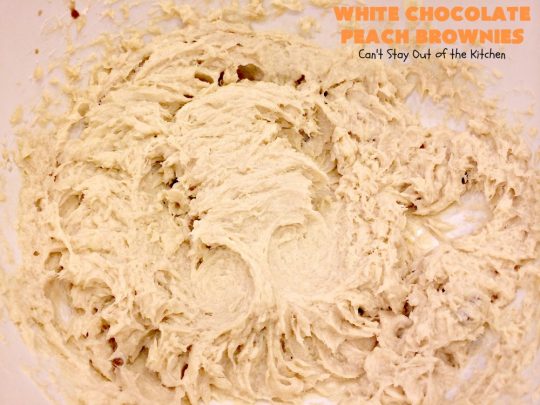 White Chocolate Peach Brownies | Can't Stay Out of the Kitchen | these fantastic #brownies are ooey, gooey decadent & divine! They're filled with #coconut, #walnuts, #peaches & white #chocolatechips. Then they're drizzled with white #chocolate icing. This #dessert is fantastic during the #summer when peaches are in season.