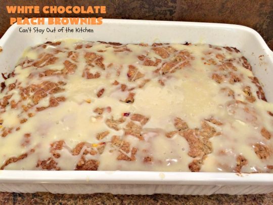 White Chocolate Peach Brownies | Can't Stay Out of the Kitchen | these fantastic #brownies are ooey, gooey decadent & divine! They're filled with #coconut, #walnuts, #peaches & white #chocolatechips. Then they're drizzled with white #chocolate icing. This #dessert is fantastic during the #summer when peaches are in season.