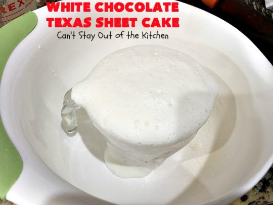 White Chocolate Texas Sheet Cake | Can't Stay Out of the Kitchen | spectacular #TexasSheetCake made with #Ghirardelli #WhiteChocolate instead! Terrific for potlucks, #tailgating parties or any kind of family get-together. #holiday #chocolate #HolidayDessert #ChocolateDessert #WhiteChocolateTexasSheetCake