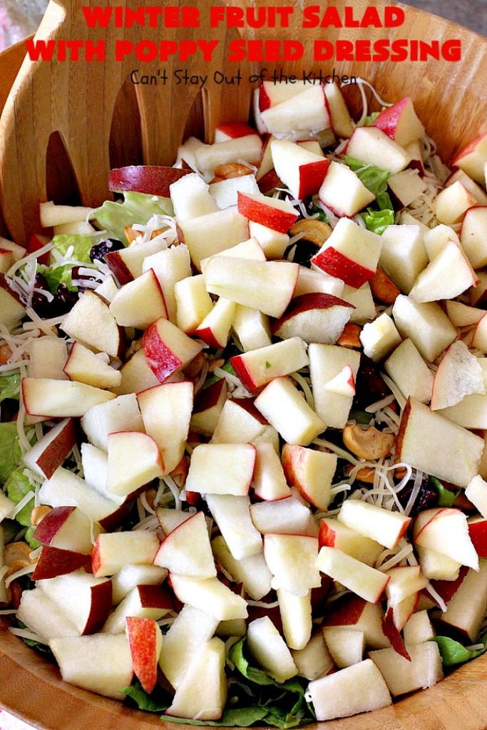 Winter Fruit Salad with Poppy Seed Dressing | Can't Stay Out of the Kitchen | this is our favorite #tossedsalad. It includes #cashews, #Swisscheese, #craisins, #apples & #pears. The homemade #poppyseeddressing is absolutely mouthwatering. This terrific #salad is wonderful for company or #holiday dinners like #FathersDay. #glutenfree