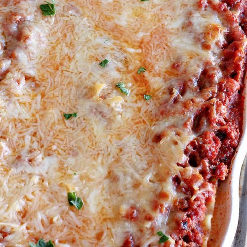 World's Best Lasagna | Can't Stay Out of the Kitchen | Wow your family, friends or company with this amazing #lasagna #recipe. Every bite will knock your socks off! #ItalianSausage adds zip & 3 cheeses, including loads of #Mozzarella & #parmesan make this cheesy entree even more delectable. #pasta #Italian #GroundBeef #RicottaCheese #BestLasagna #FavoriteLasagna #WorldsBestLasagna #WorldsGreatestLasagna
